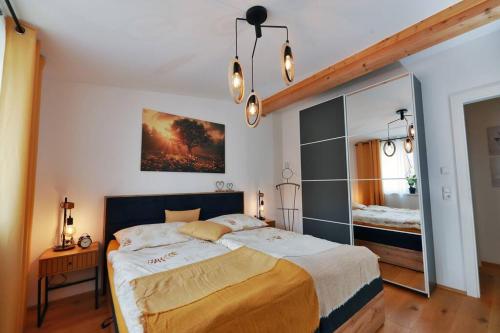 Una cama o camas en una habitación de Apartment Hauser Kaibling