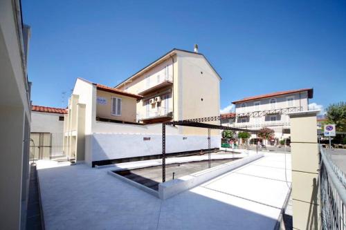 a view of a building from a balcony at Appartamento nel centro di Forte dei Marmi in Forte dei Marmi