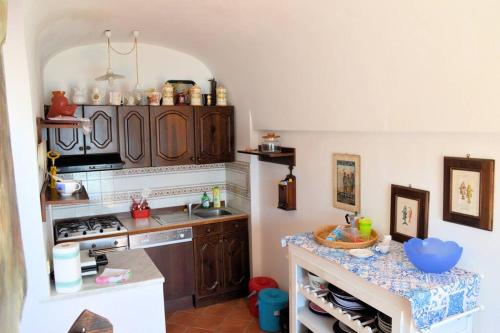 a kitchen with a sink and a counter top at Elegante alloggio Da Zia Flá in Portovenere