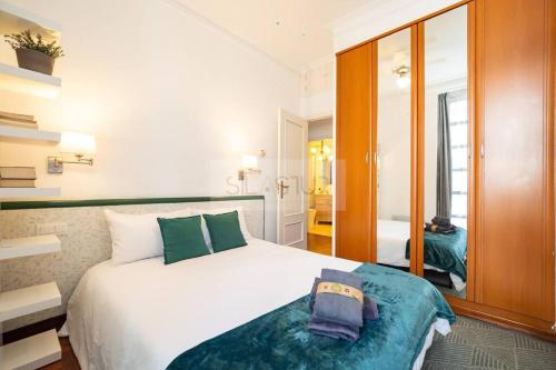 Ένα ή περισσότερα κρεβάτια σε δωμάτιο στο Pelayo 2 Apartamento