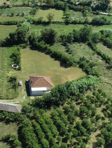 an aerial view of a house in a field at Casa L in Ulcinj