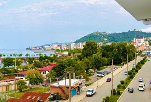 a view of a city with a street and a road at Bless You in Piraziz