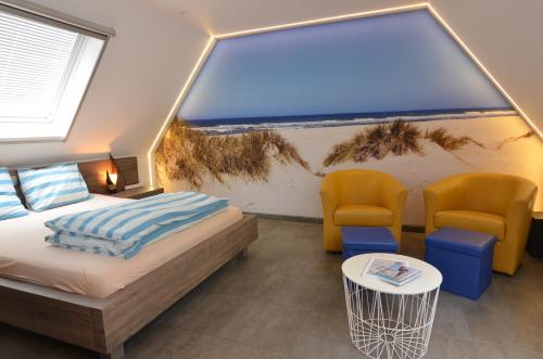 Voodi või voodid majutusasutuse B&B wellness Sea Nat voor Naturisten toas