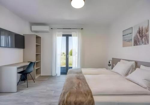 Ένα ή περισσότερα κρεβάτια σε δωμάτιο στο Villa Davide