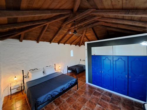 Ένα ή περισσότερα κρεβάτια σε δωμάτιο στο Tsivouli Accommodation