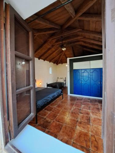Ένα ή περισσότερα κρεβάτια σε δωμάτιο στο Tsivouli Accommodation