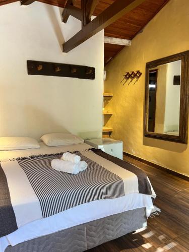 Casa deck Caraívaにあるベッド