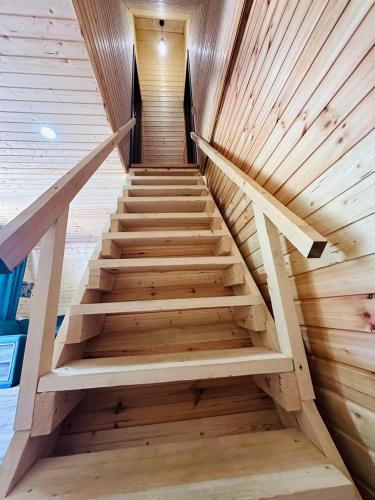 a wooden staircase in a sauna at Villa Wood in Mestia N 2 in Mestia