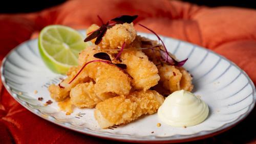a plate of food with shrimp and a dollop of butter at The Municipal Hotel Liverpool - MGallery in Liverpool
