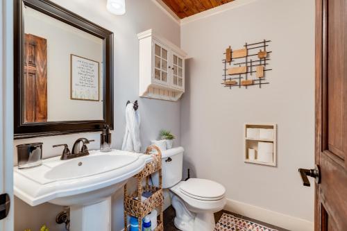a bathroom with a sink and a toilet at Luxury Midterm Rental for Families, Medical and Corporate Professionals Cincy in Cincinnati