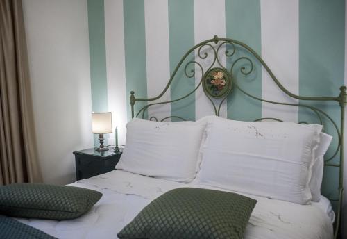 Ένα ή περισσότερα κρεβάτια σε δωμάτιο στο B&B Dolci Sogni