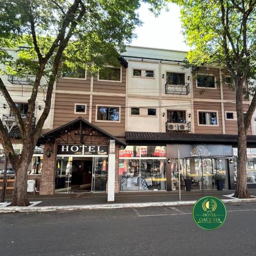 a hotel on the side of a street at Hotel Gaucha in Guaíra
