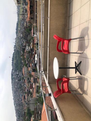 a pair of red shoes on the side of a building at Hotel Baylan İzmir in Izmir