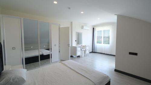 Katil atau katil-katil dalam bilik di Prestıge Villa