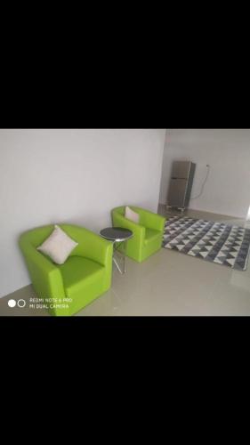 Χώρος καθιστικού στο Casapedian 002 Guesthouse Banda Aceh 3BR