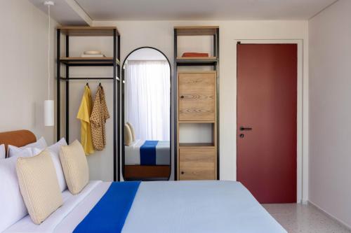 Letto o letti in una camera di Okupa