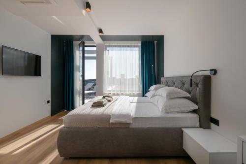 Katil atau katil-katil dalam bilik di Luxus Villa Nerra in Medulin mit Meerblick