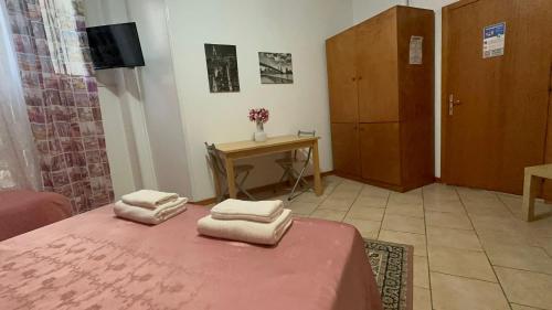 Postel nebo postele na pokoji v ubytování RESIDENCE LUPIAE