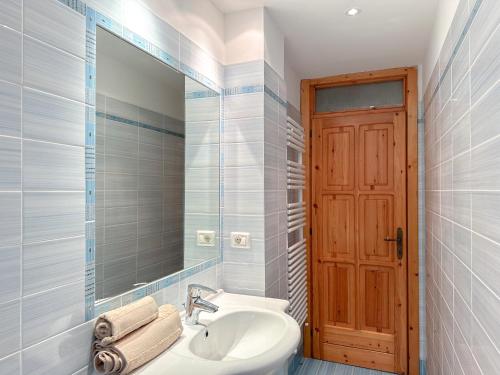a bathroom with a sink and a mirror at Gio' Garden in Gabicce Mare