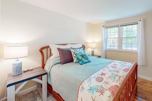 Ένα ή περισσότερα κρεβάτια σε δωμάτιο στο Falmouth Beach House