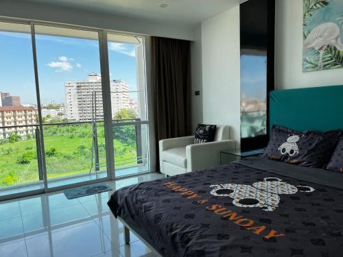 Ένα ή περισσότερα κρεβάτια σε δωμάτιο στο City Center Cozy