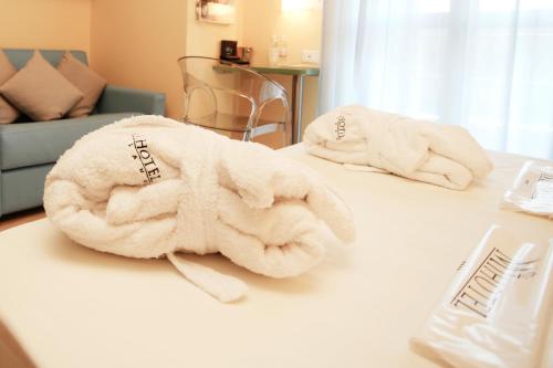 Кровать или кровати в номере MiHotel