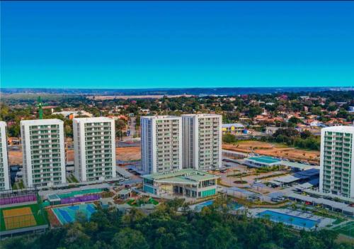 an aerial view of a city with tall buildings at Departamento a estrenar in Colonia Mariano Roque Alonso
