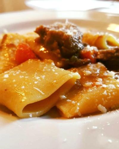 a plate of food with pasta and sauce on it at Masseria Fontana dei Fieri in Pietrelcina
