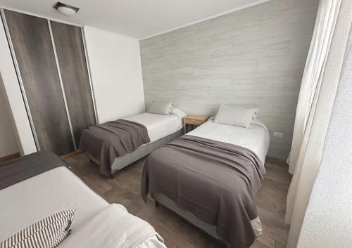 Zimmer mit 2 Betten in einem Zimmer in der Unterkunft Chacra María Ramona in Las Golondrinas