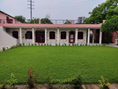 Un jardín fuera de Divya Anubhuti Pravas