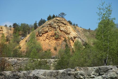 a large rock sitting on top of a mountain at Luisenhof in Geisfeld