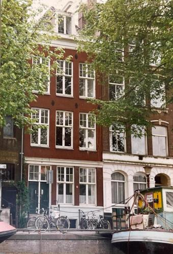 a building with bikes parked in front of it at Central Art Apartment - Nieuwmarkt area in Amsterdam