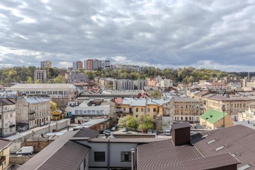 an aerial view of a city with buildings at Old City apart in Lviv
