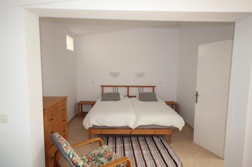Postel nebo postele na pokoji v ubytování Estupendo bungalow cerca del mar