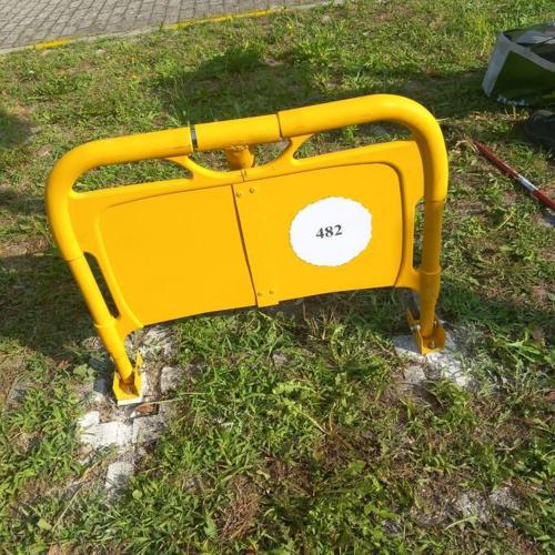a yellow object is sitting on the grass at appartamento Verdemare in Eraclea Mare