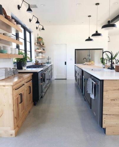 a large kitchen with wooden cabinets and a large island at Black Barn Ranch 25 Acres Wpool Near Downtown in San Luis Obispo