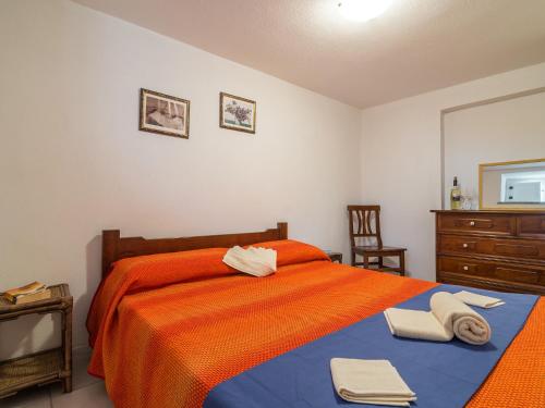 Ένα ή περισσότερα κρεβάτια σε δωμάτιο στο Casa a 150 m Dalla Spiaggia