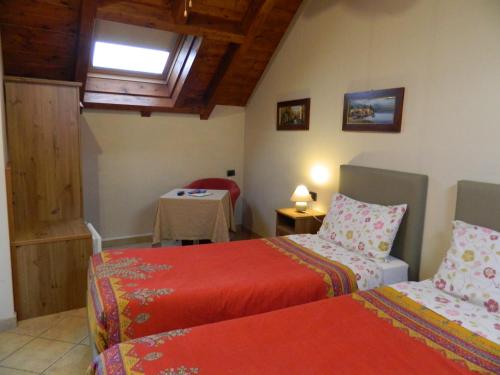 Säng eller sängar i ett rum på Osteria San Giuseppe