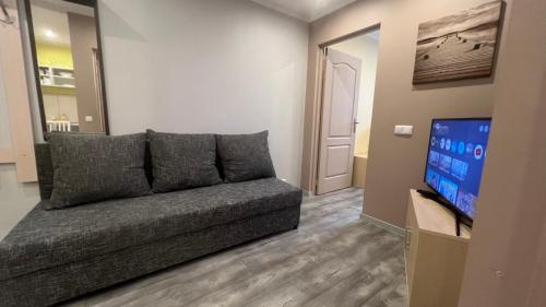Μια τηλεόραση ή/και κέντρο ψυχαγωγίας στο Riverside Promenade apartment M3