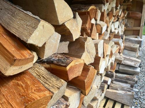 a pile of wood stacked on top of each other at Mullingar in Pitlochry
