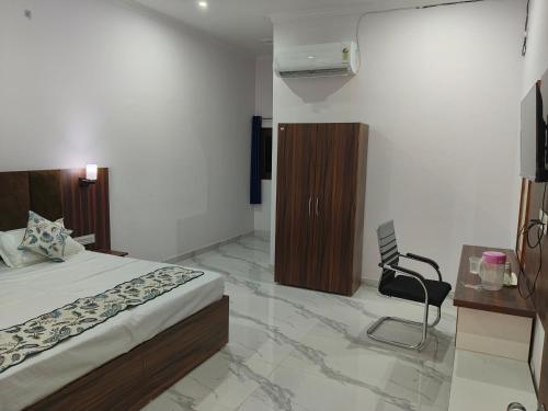 Cama o camas de una habitación en Atithi Inn Khajuraho