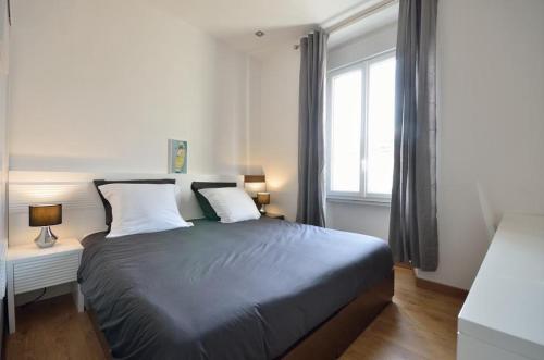 Posteľ alebo postele v izbe v ubytovaní Superbe appartement
