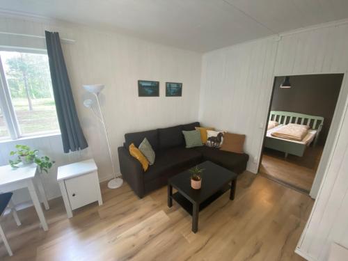 Postel nebo postele na pokoji v ubytování Hus i ljuset
