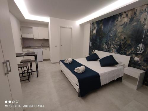 Ένα ή περισσότερα κρεβάτια σε δωμάτιο στο Tropea Travel's House