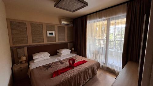 Ένα ή περισσότερα κρεβάτια σε δωμάτιο στο ARGISHT SUPERIOR APARTMENT