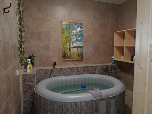 Bilik mandi di Cosy house for relaxing and sightseeing