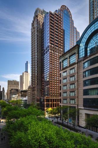 a city skyline with tall buildings in a city at Omni Chicago Hotel in Chicago
