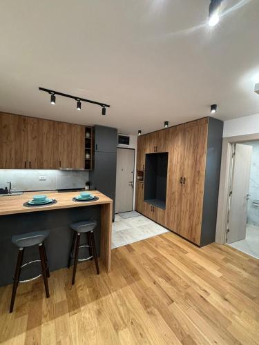 Kuchyň nebo kuchyňský kout v ubytování Apartman Simi II
