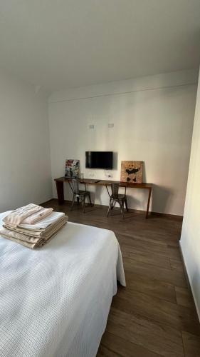 Postel nebo postele na pokoji v ubytování Casa Basilico