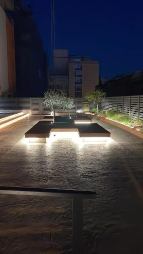 a row of lights in a parking lot at night at Casanova Bluelife in Trieste